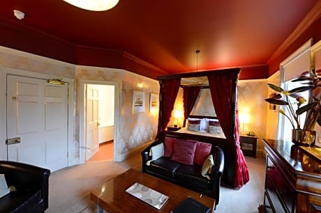 Four-Poster Deluxe Room