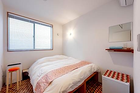 Small Double Room with Shared Shower and Toilet