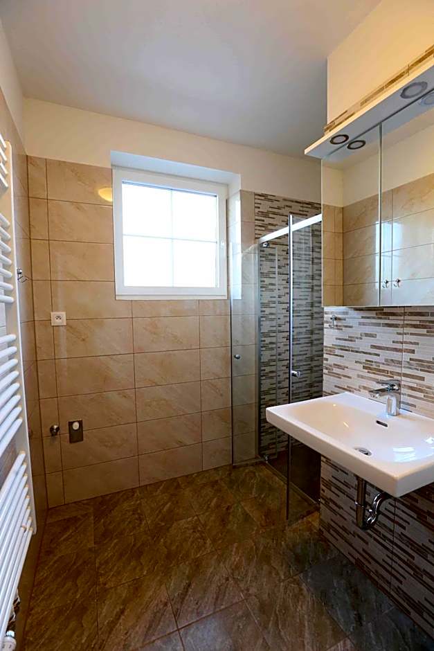 Apartmány AURA