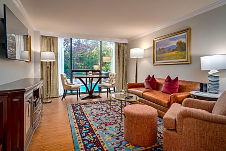 One-Bedroom Suite with Historical Photos of President Bush and pool view