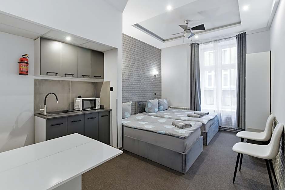 Queen Apartments
