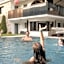 Aparthotel Familiaris - Family Apartments - Pools & Spa in Dolomites