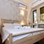 Aurelio Deluxe Rooms