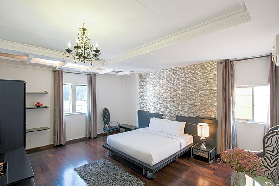 A & Em Corp - The Petit Hotel