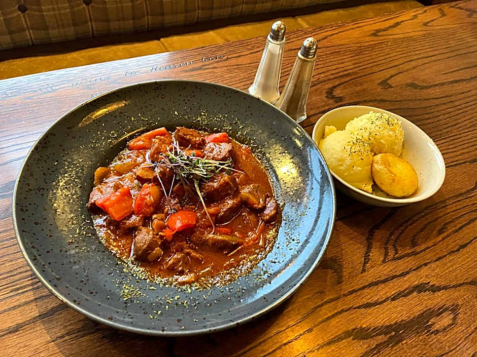 The Copper Still Bar Restaurant & Boutique Rooms