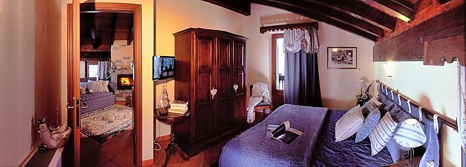 Aparthotel Foyer d'antan SUITE con caminetto hammam o vasca idromassaggio