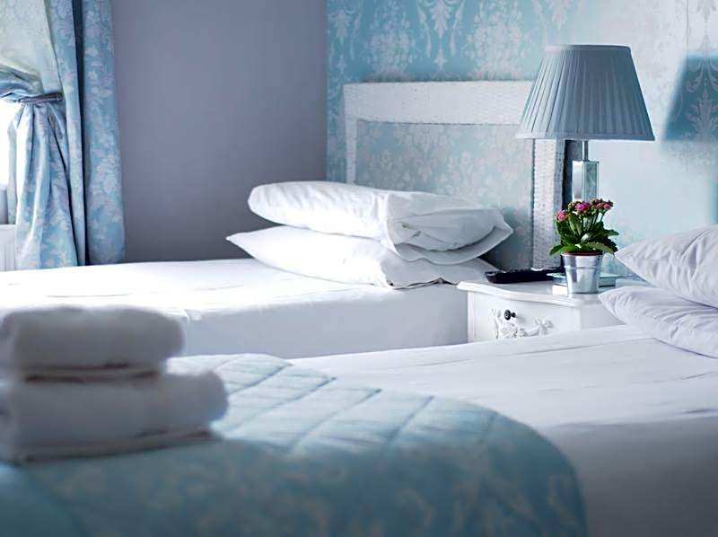 The Cambridge Guest House by Tas