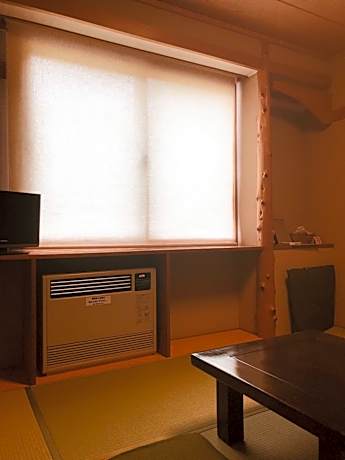 Single Room with Shared Shower and Toilet