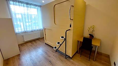 Single Bed in Dormitory Room