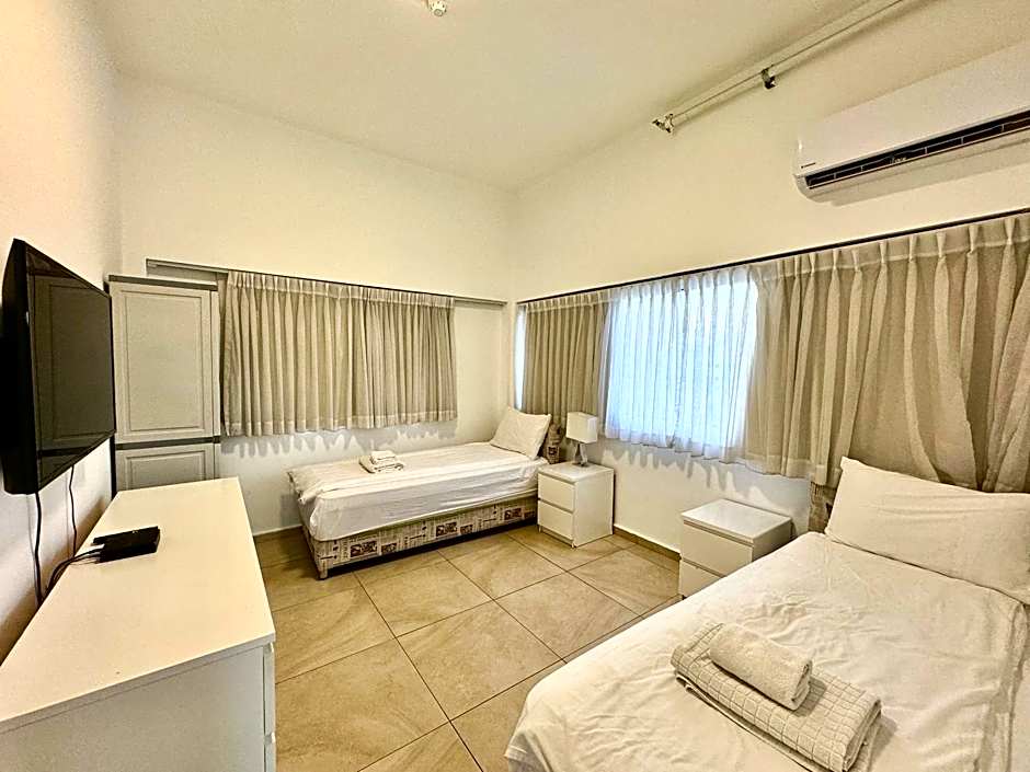 Begin19 Apartments & Hostel