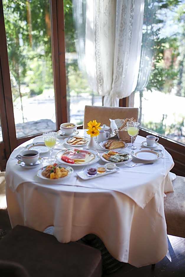 Country Club Hotel & Suites