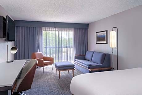 King Room with Sofa Bed and Roll-in Shower - Mobility and Hearing Accessible