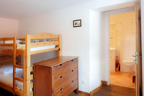 Single Bed in Dormitory Room