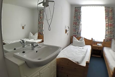 Standard Twin Room with external shared WC and Shower