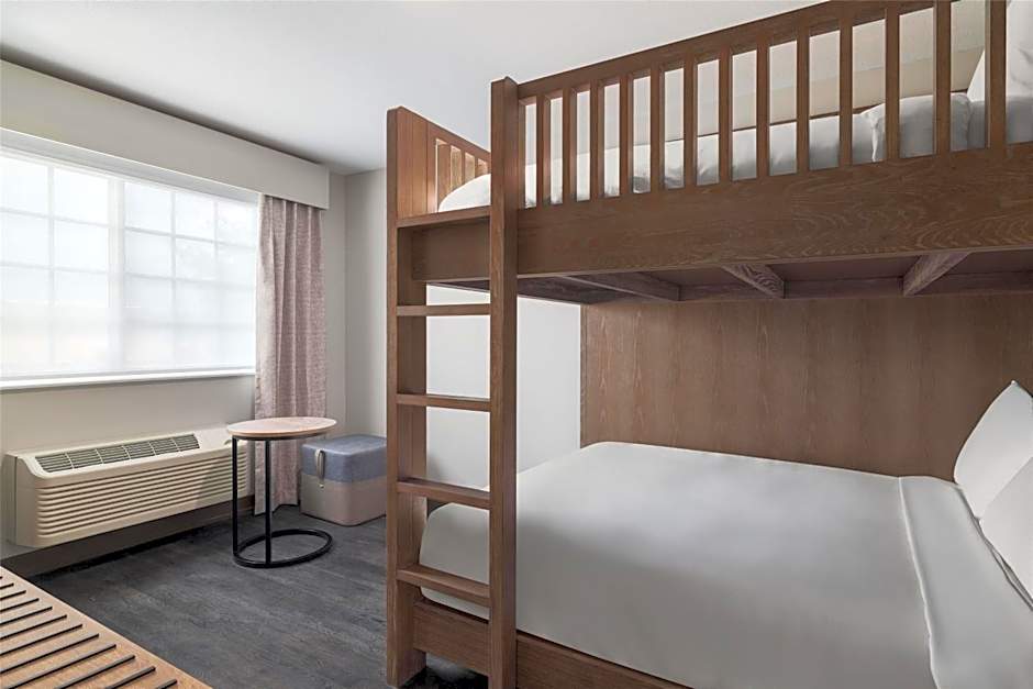 Photo 1 of 11 of Queen Room with Two Queen Beds, Bunk Bed and Sofa Bed