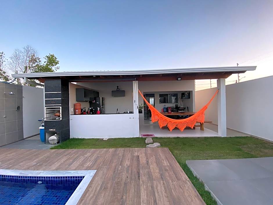 CASA COM PISCINA NA PRAIA
