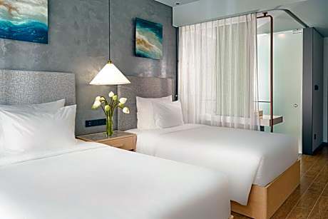 Deluxe Twin Room with Balcony and City View (Include Welcome drink & Airport shuttle bus)