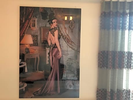 Quadruple Room (3 Adults + 1 Child)