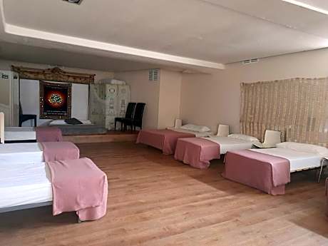 Single Bed in Dormitory Room