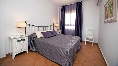 One-Bedroom Suite Apartment (2 Adults + 2 Children)