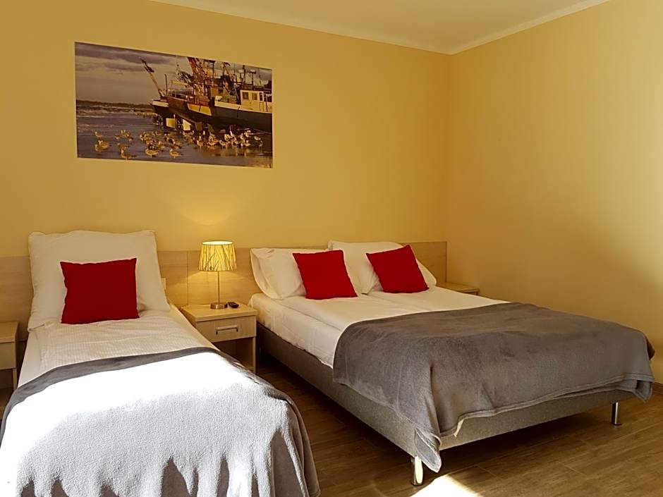 Pokoje do wynajęcia "Pod Wydmami" Sarbinowo PRZY PLAŻY , PLAC ZABAW , ROWERY