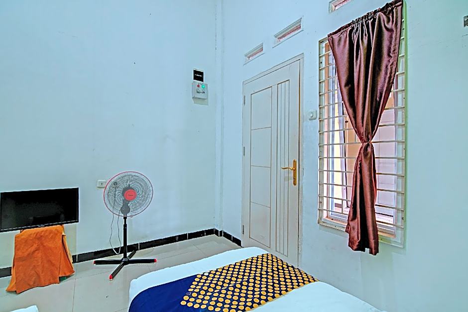 Hotel O Penginapan Puti SyariahNearBandara Sultan Syarif Kasim II