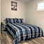 Guest Suite in Regina - Queen Bed