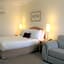 Carlyle Suites & Apartments