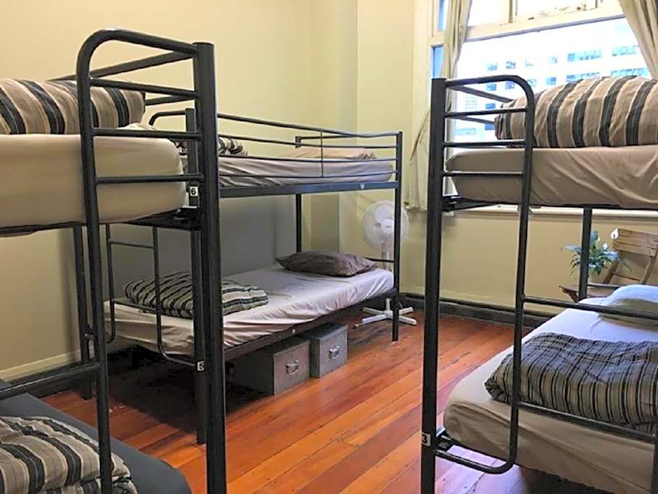 Surf 'N' Snow Backpackers Across Sky Tower