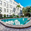 Tropical Beach Condo - Pool, Shops, 86" TV, WiFi