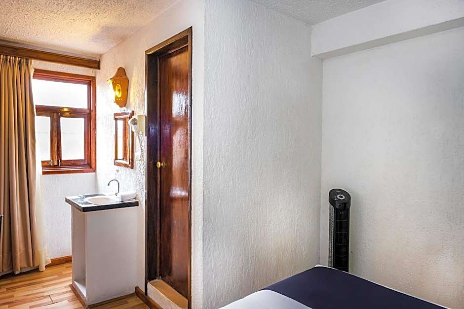 Capital O Hotel Central