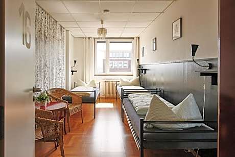 Bed in 3-Bed Dormitory Room with Shared Bathroom