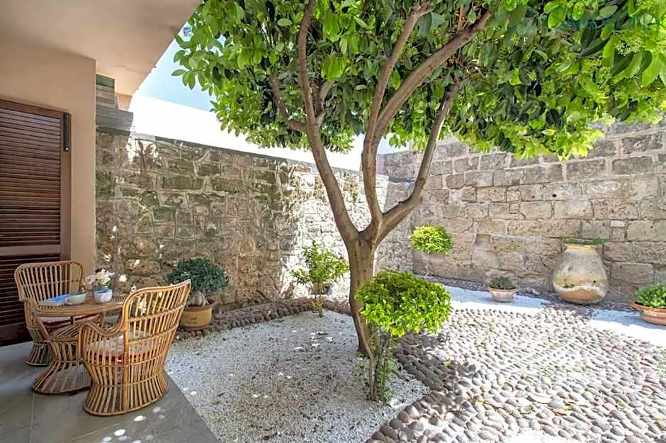 ClickSardinia Alghero Spectacular waterfront Neptune apartment with sea-facing terraces and garden
