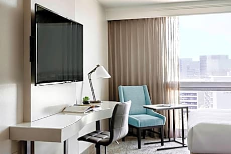 Guest Room with Two Double Beds, Balcony and Pool View