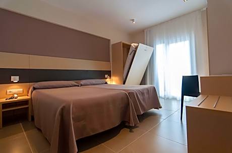 Triple Room (2 Adults + 1 Child)