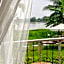 White Wall Riverfront Hotel