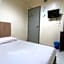 OYO 89760 Harmoni Inn Hotel
