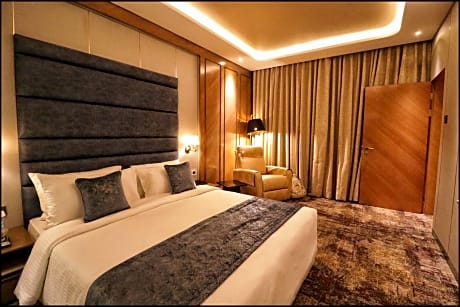 Premium Suite Room with Two Way Airport Transfer on Sharing Basis