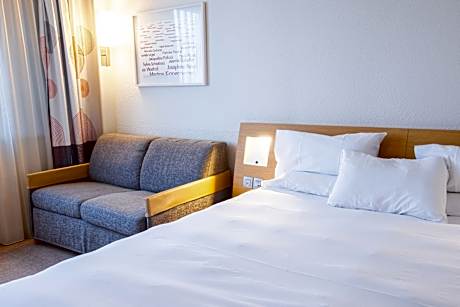 Standard Room with one double bed and sofa