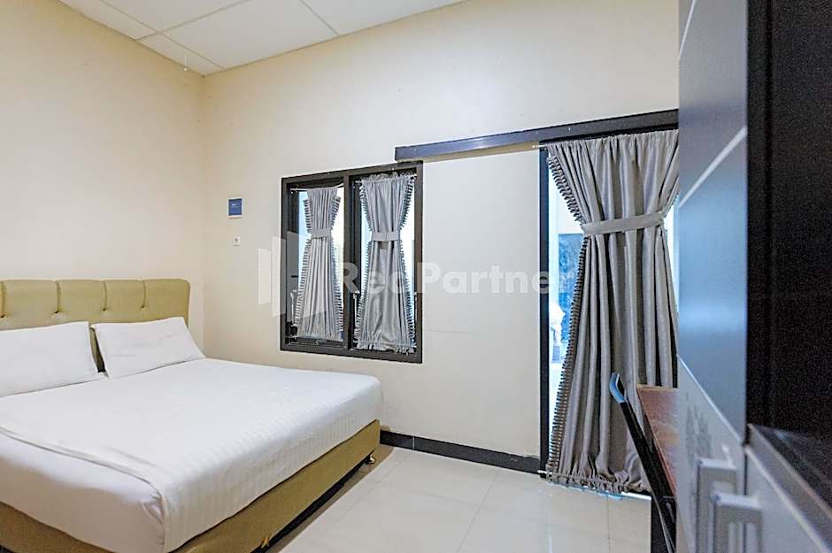 Wisma Merdeka Syariah RedPartner