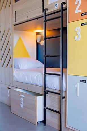 Bed in 4 pax dormitory with shared external bathro