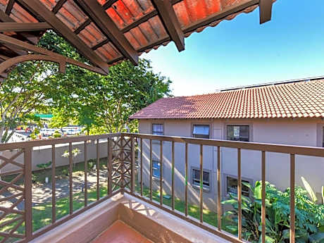 Superior Room with Balcony, One King and Two Single Beds