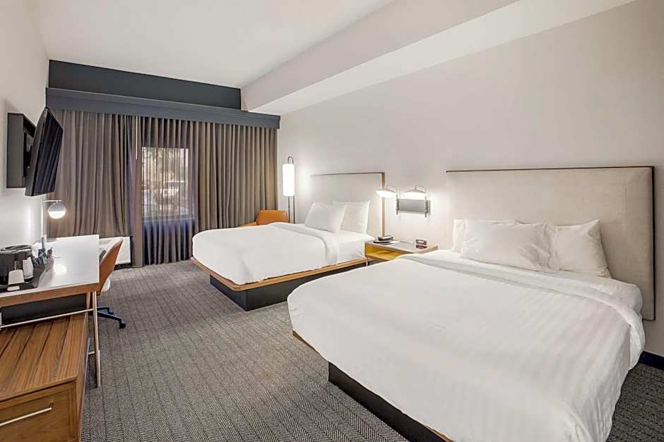Photo 1 of 9 of 2 Queen Beds Guestroom, Hearing Accessible, Courtyard or Pool View