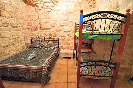 Quadruple Room with Private Bathroom