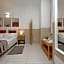 Opera Inn Suites - Rooms and Apartments