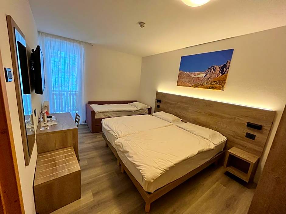 Photo 1 of 9 of Quadruple Room