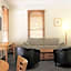 Carlyle Suites & Apartments