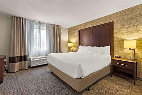 1 King Bed Efficiency Suite Nonsmoking Upgrade