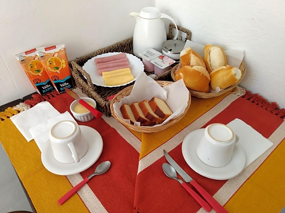 Suítes Recanto cama e café