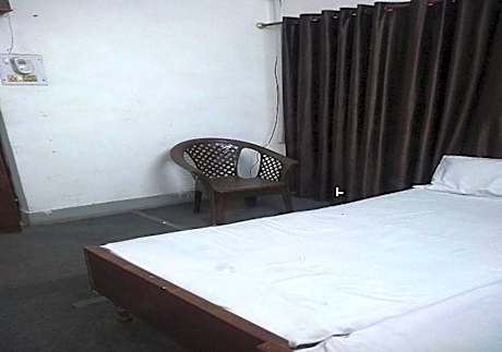 Single Bed in Dormitory Room